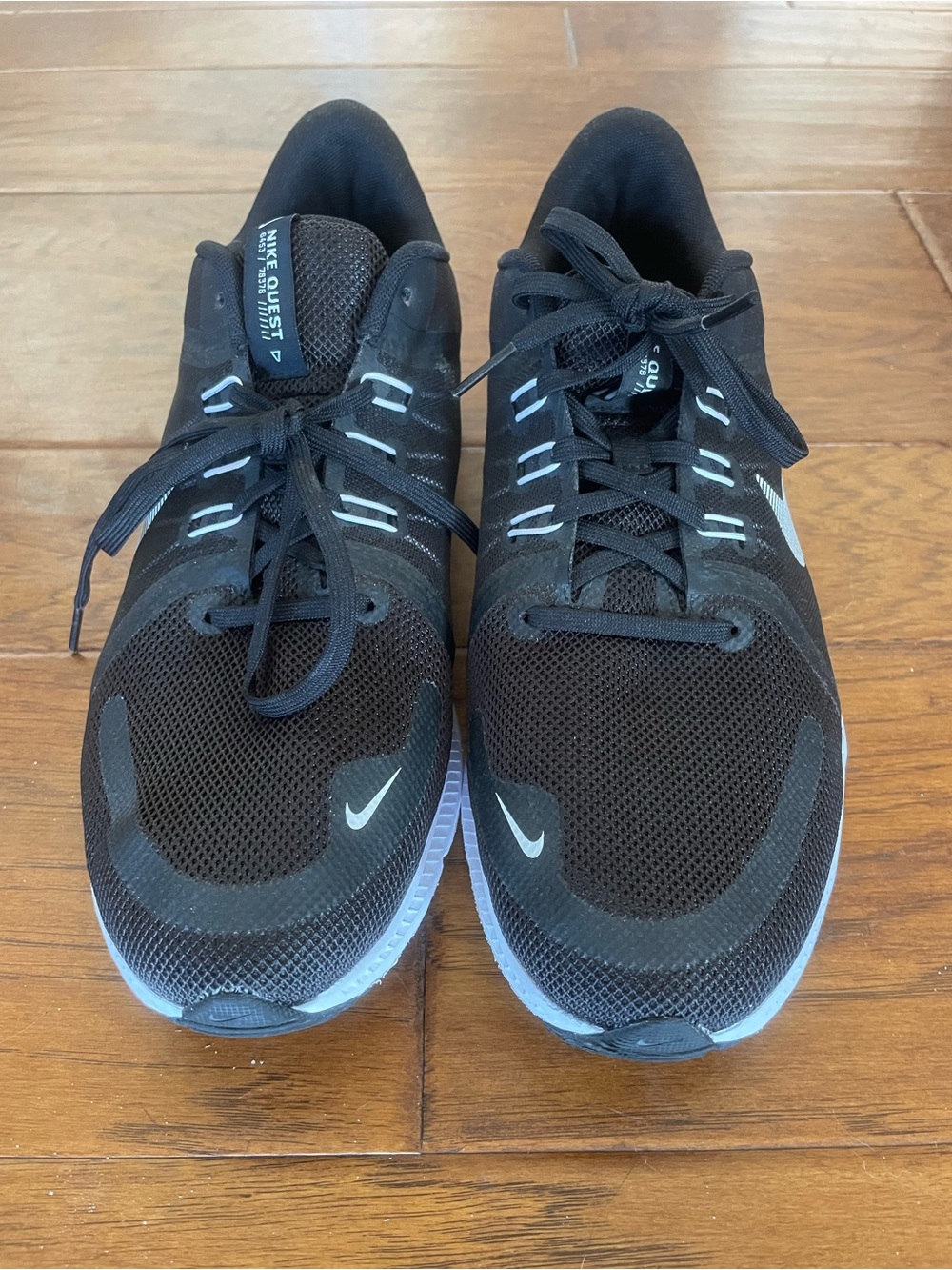 Nike Black and White Woman’s Running Sneakers